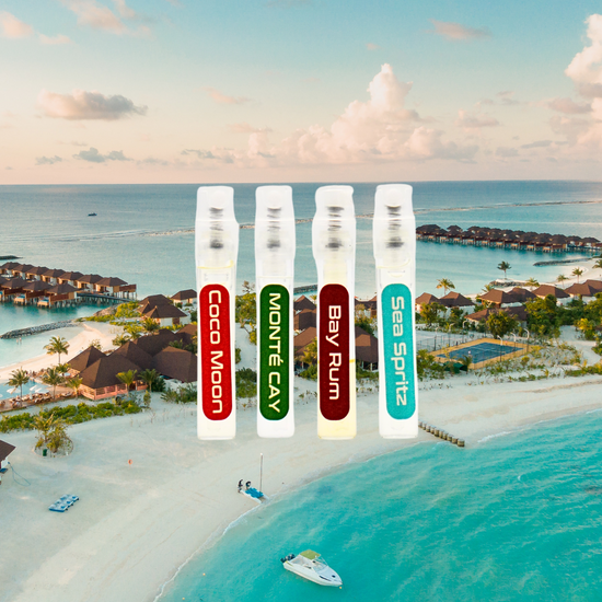 Four sample bottles of parfum against a tropical beach and resort background