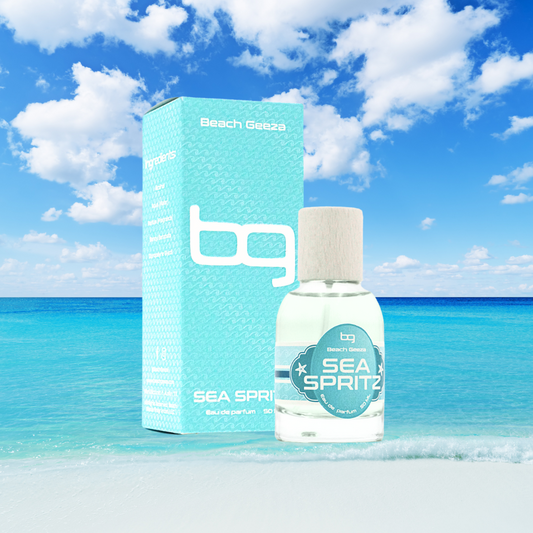 Bottle and packaging of 'Beach Geeza Sea Spritz' against a beach backdrop
