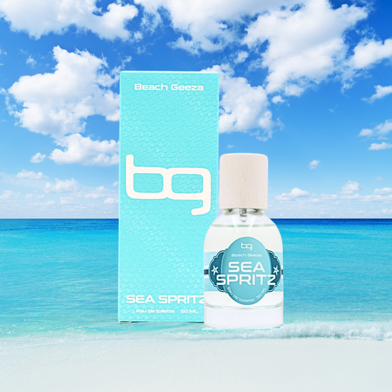 Bottle of Beach Goats Sea Spritz with packaging against a beach backdrop