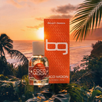 Beach Geeza Coco Moon perfume bottle and packaging with a sunset beach background