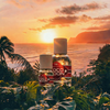 Two bottles of COCO MOON products on a tropical background with a sunset.