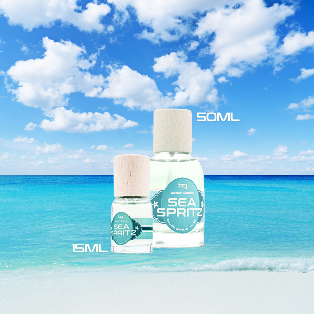 Two bottles of Sea Spritz with beach and blue sky background